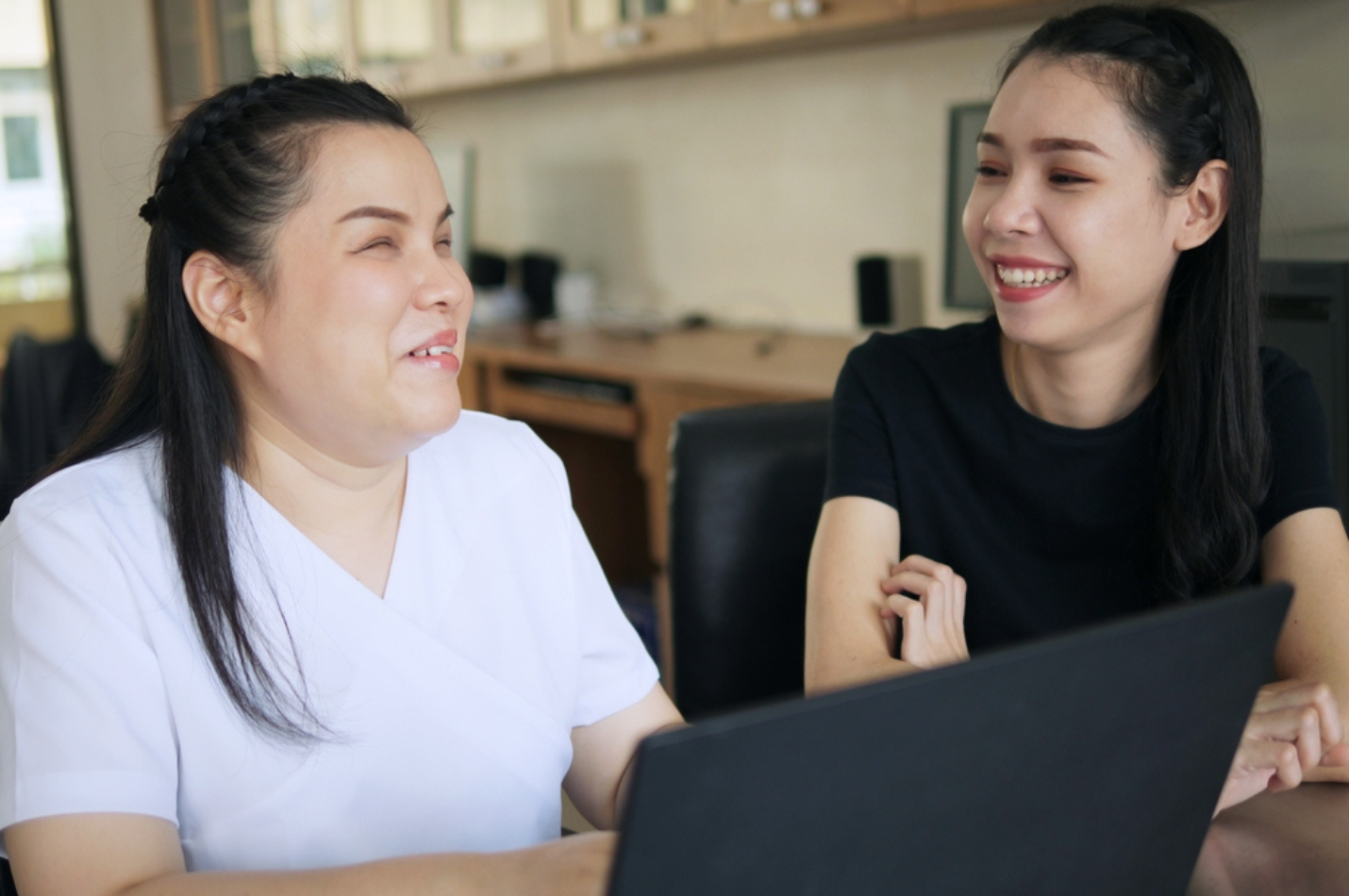 Woman with vision impairment using a computer